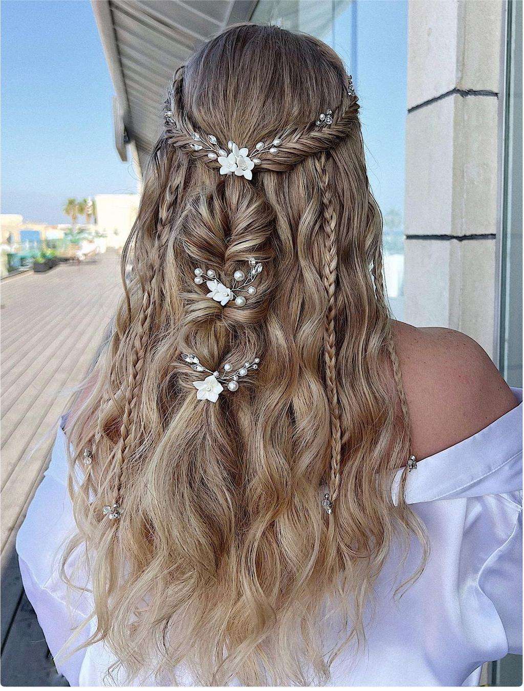 boho fishtail braidedcrown half up half down hairstyle via zhanna_syniavska