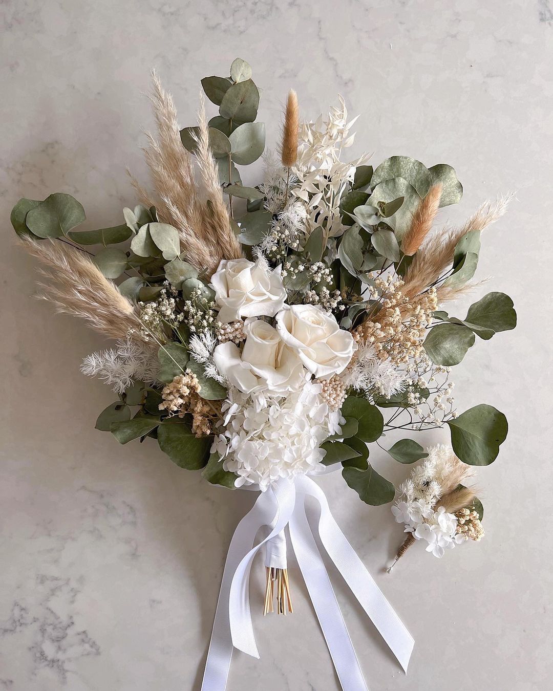 dried hydrangeas pampas grass eucalyptus wedding bouquet via _leia.and.me