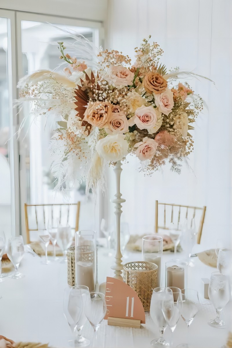 elegant tall bohemian wedding centerpiece with pampas grass