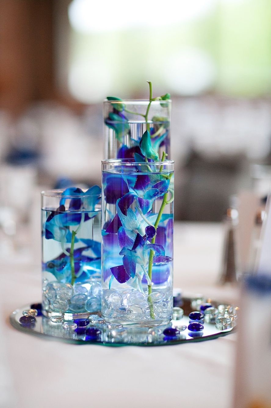 floating blue and purple orchid wedding centerpiece