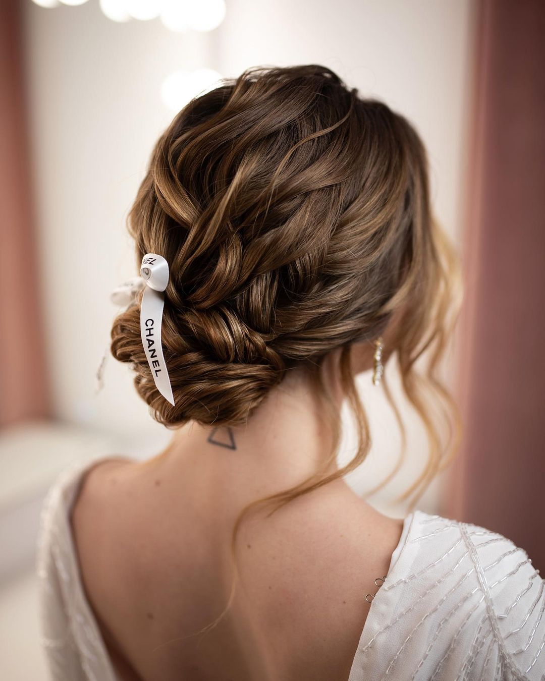 messy low bun valentine's day hairstyle via beautybyrockagirl