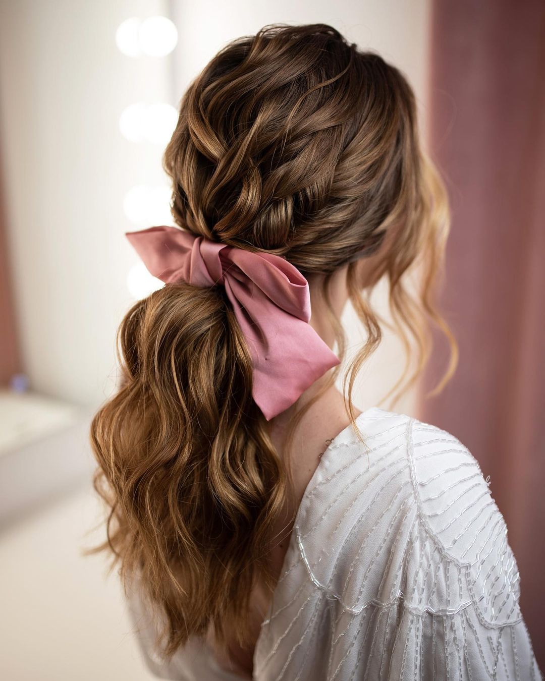 messy low ponytail hairstyle via beautybyrockagirl