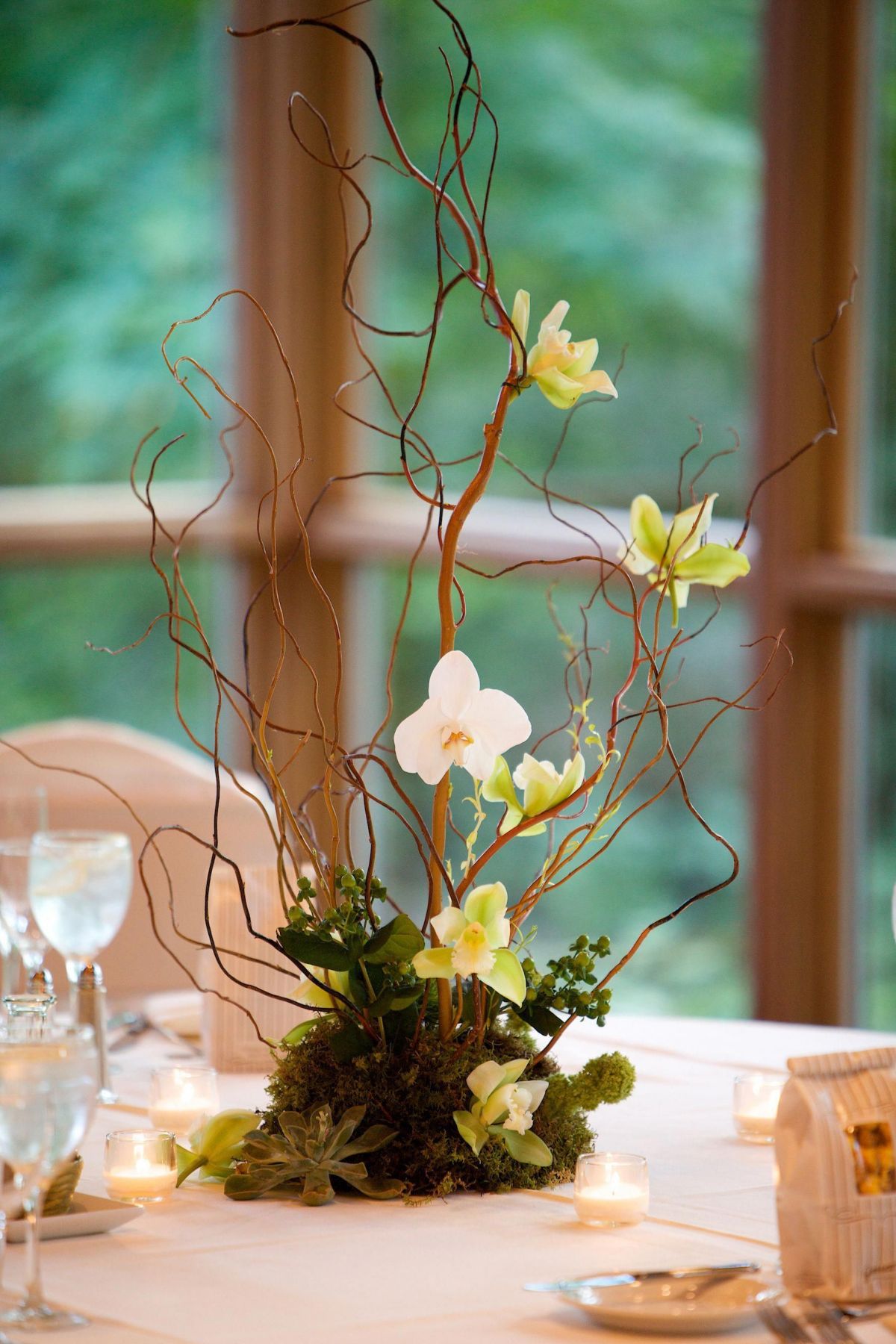 potted orchids and moss wedding centerpiece
