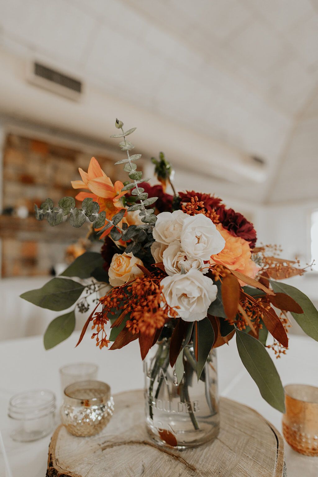 rustic bohemian terracotta mason jar wedding table decoration