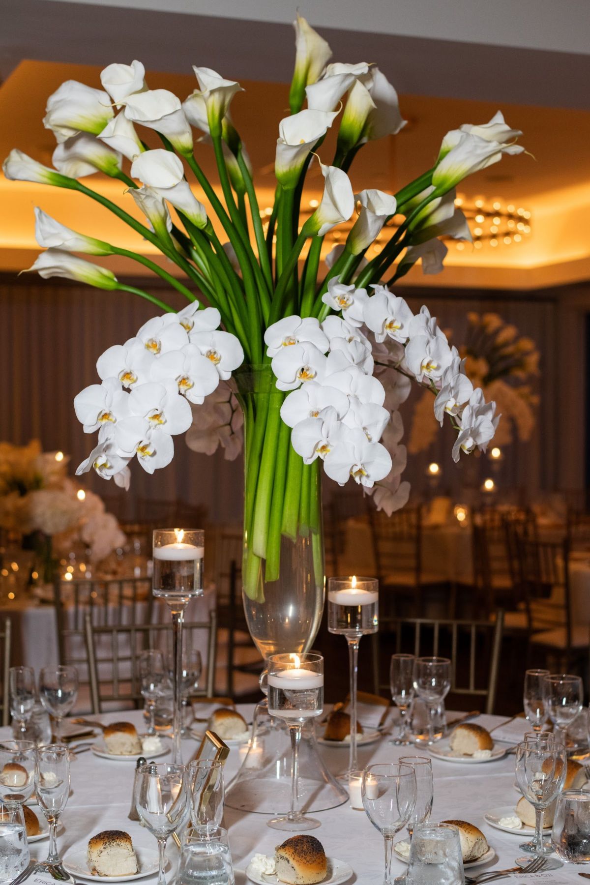 tall calla lily and orchids wedding centerpiece