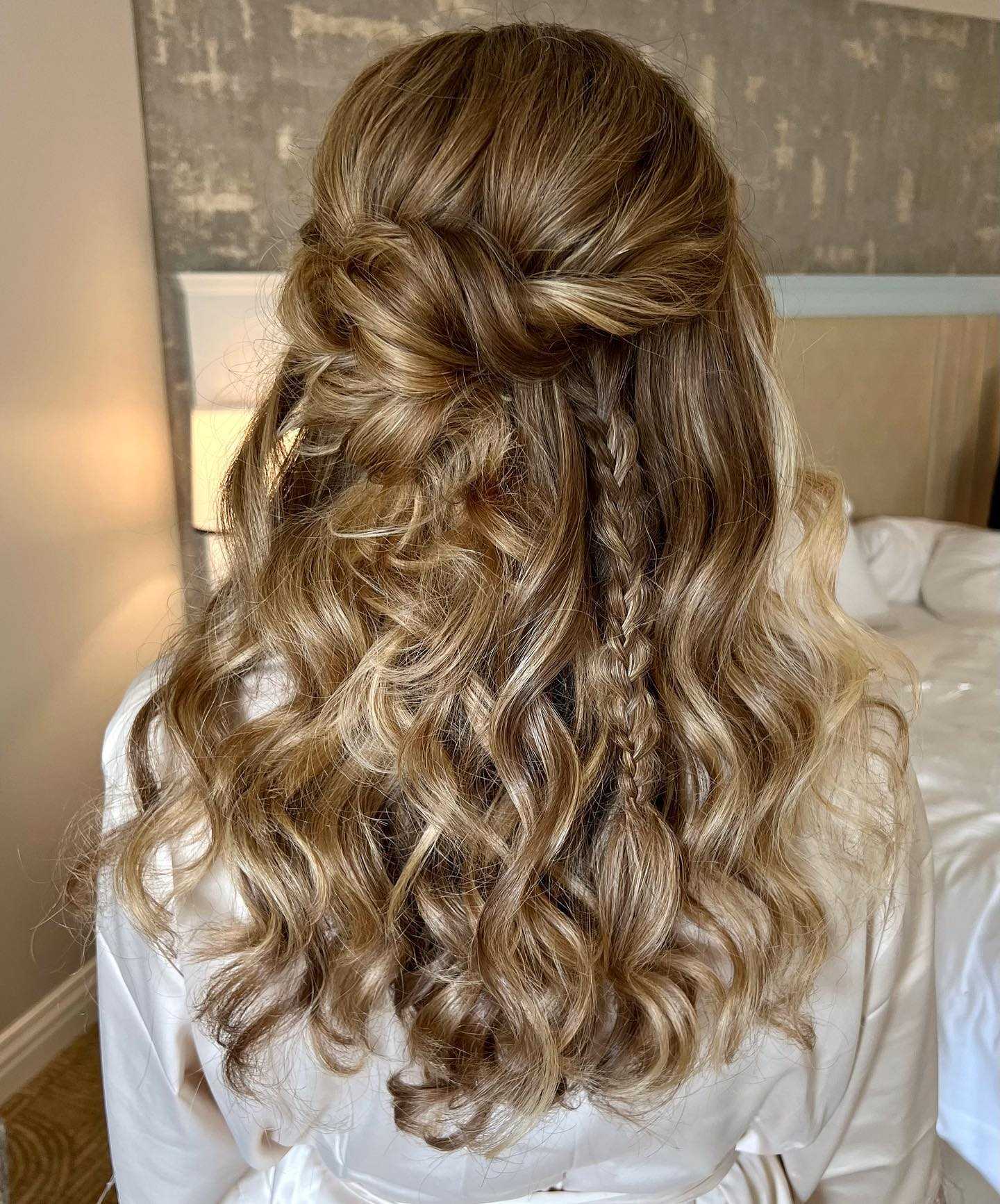 twisted half up half down bridesmaid hairstyles for medium length