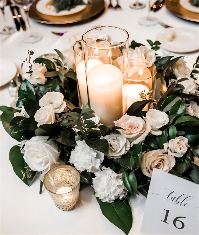 winter white and greenery wedding centerpiece