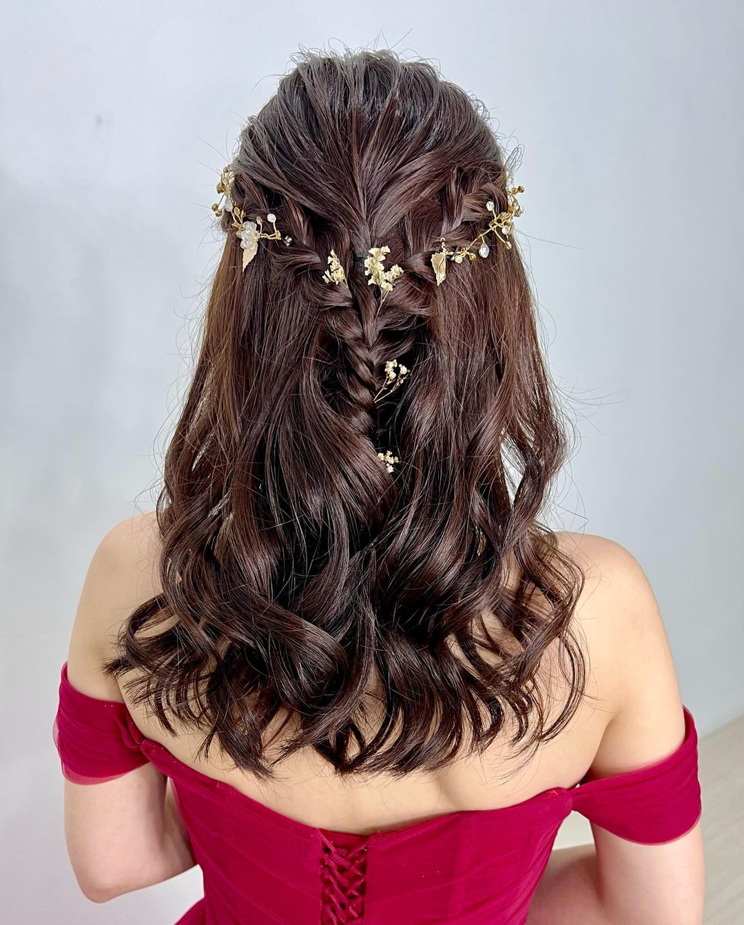 braided half up half down medium length twisted prom hairstyle via joyceler_makeupartist