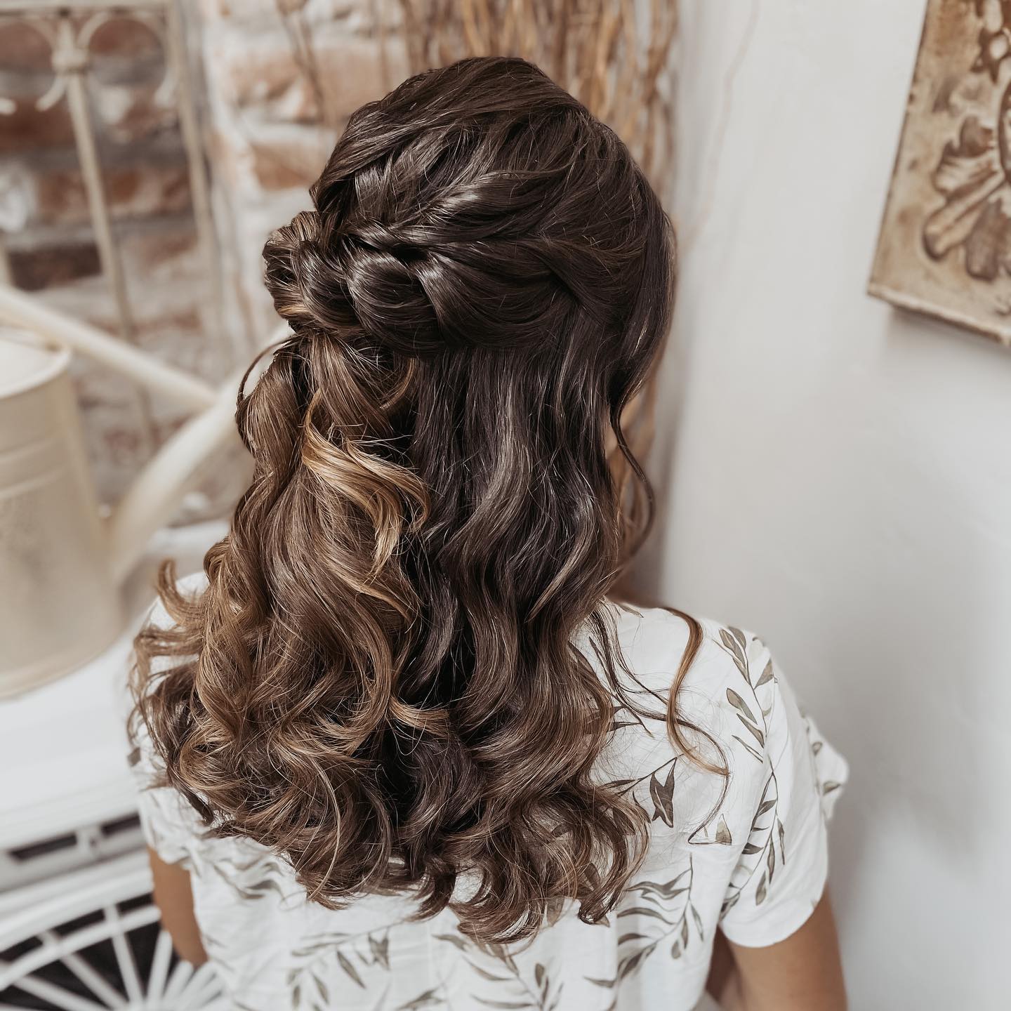 medium length twisted half up half down prom hairstyle