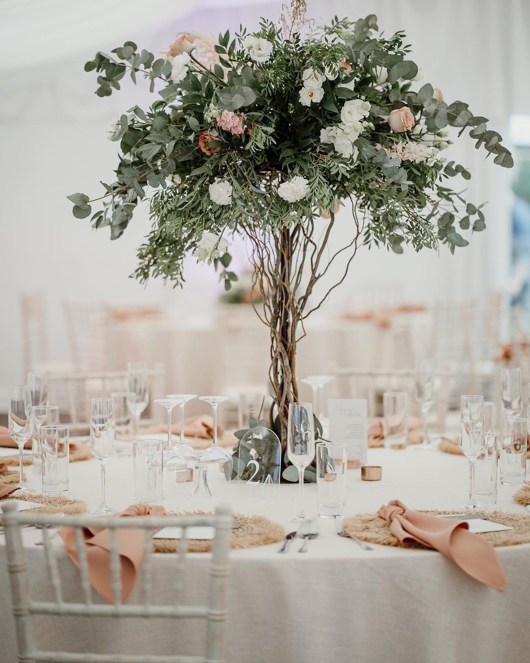 tall greeenry tree wedding centerpiece via endless_weddingdecoration